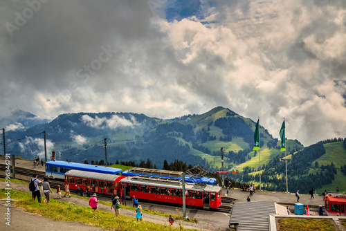 Panoramic summer landscape over Lake Lucerne, Lake Zug and Swiss Alps from Rigi-Kulm viewpoint summit of Mount Rigi. Alpine scenery toward mountain peaks in Canton of Lucerne, Central Switzerland.