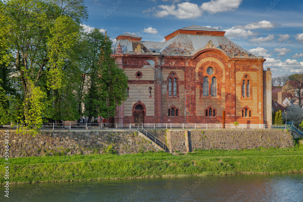 Synagogue on the bank of the river Uzh. Uzhhorod, Ukraine.