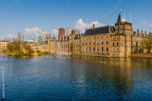 The Binnenhof castle on Hofvijver lake in the Hague city, South Holland, Netherlands which is one of the oldest Parliament buildings in the world. photo