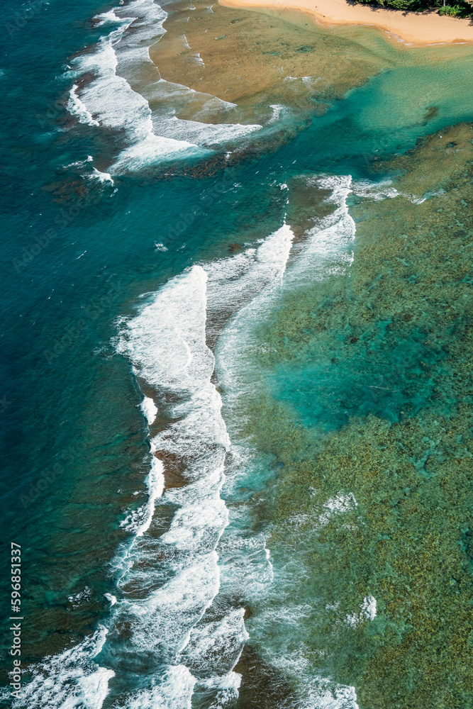 Kauai Napali Coast aerial view from Helicopter tour, golden hour Kauai Napali Coast aerial view from Helicopter tour, golden hour