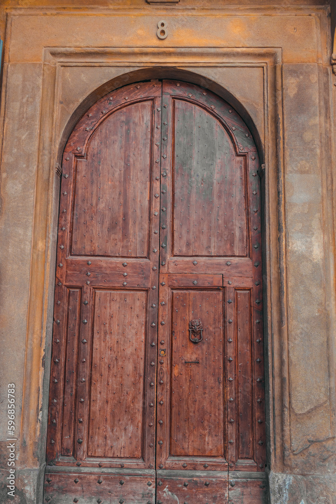 an old medieval door in a historic building. High quality photo