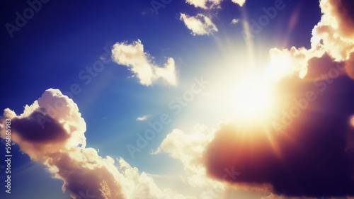 Bright sun in the sky with clouds. The sun's rays shine on the clouds. International Sun Day. Generated AI.