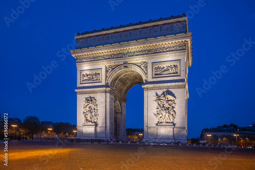 Arc de Triomphe de l Etoile at the top of the Champs-Elysees boulevard by night, Paris, France © pyty