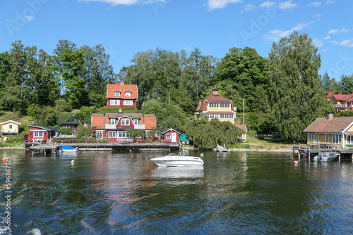 Canvas Print houses on the river thames