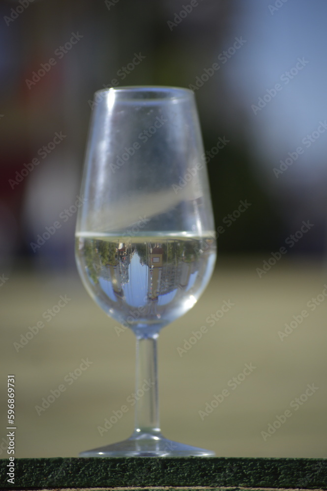Obraz premium A glass of sherry wine in the famous April fair, Seville, Spain 