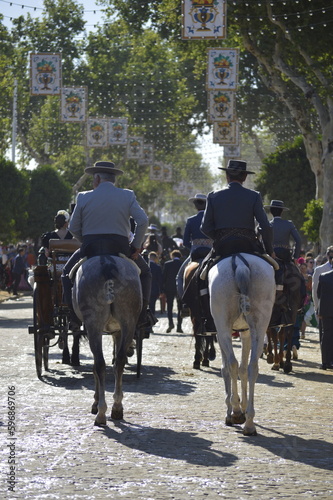 Horse riding in the world famous Feria de abril, seville, spain