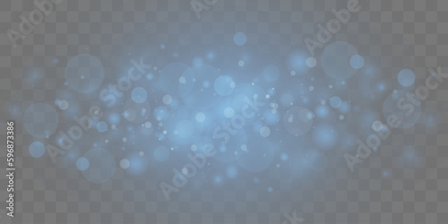 Shiny particle effect. Vector sparkles on a transparent background. Christmas light effect. Shiny magical dust particles. Sparks of dust and stars shine with a special light.