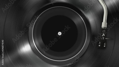 Platter rotates on vintage turntable with needle play music