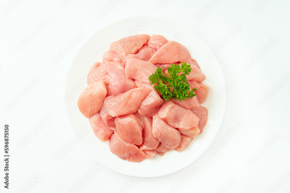 Fresh frozen pieces of turkey meat on a white background.Raw chicken.Frozen chicken fillet..Ogranic food and healthy eating.frozen turkey or poultry meat.