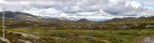 Panorama of a mountainous landscape full of hills and rocks in the north of Europe in Norway and Sweden