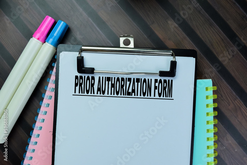 Obraz na plátne Concept of Prior Authorization Form write on paperwork isolated on Wooden Table