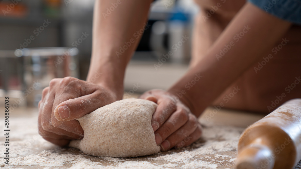 Woman hands kneading dough in the kitchen Stock Photo | Adobe Stock