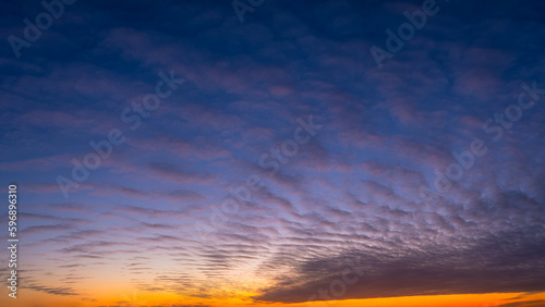 Sky with clouds during sunset. Clouds and blue sky. A high resolution photograph. Panoramic photo for design and background. © biletskiyevgeniy.com