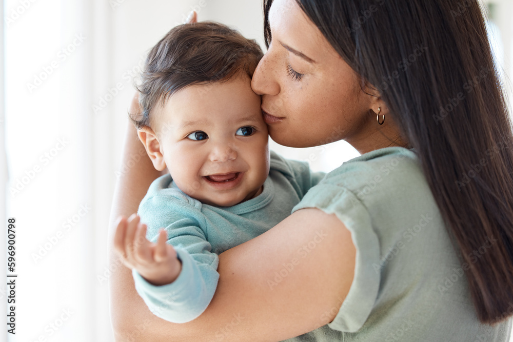 This is our love language. Shot of a mother bonding with her baby at home. This is our love language. Shot of a mother bonding with her baby at home.