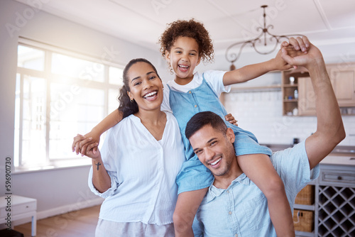 When you love what you have, you have everything you need. Portrait of a little girl bonding with her parents at home.