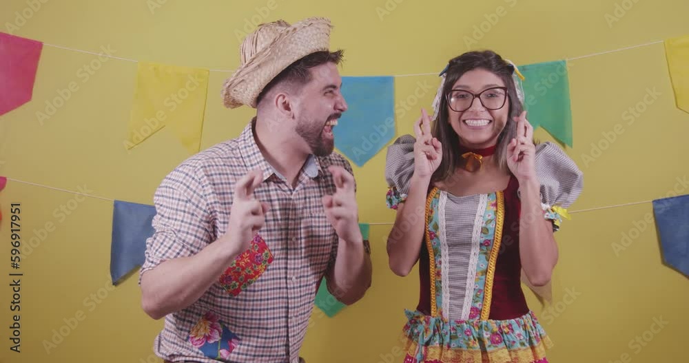 Brazilian couple, dressed in Junina party clothes, São João party. Protocol scenes.