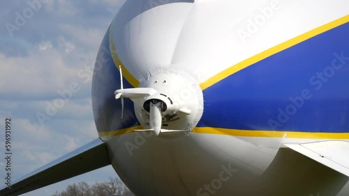 Friedrichshafen, Germany - April 9, 2023: Propeller of a modern zeppelin airship close up view. Passengers are loaded into the zeppelin