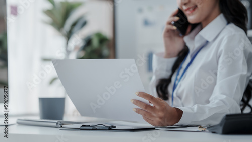 Profile of the firm's accountant for company registration, bookkeeping, asian people working with Deferred Incomes, Drawing Account, stock market, Depletion, Doubtful Debt, Equivalent Units