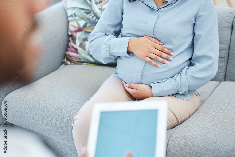 Ill be keeping tabs on your health all the way through. Closeup shot of a doctor using a digital tablet during a consultation with a pregnant woman in a medical office.