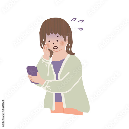 スマホを見て焦る女性