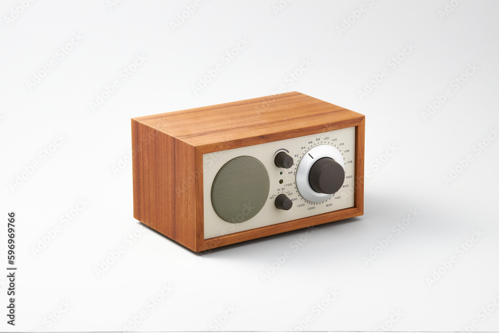 A wooden radio with a classic look that plays sweet
music