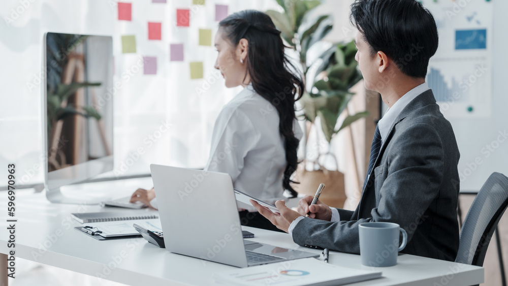 Asian male and female business partners for company registration Working with computer working together, Accrual Basis, conversion Costs, Capital Stock, Current Liabilities, Cash Short and Over Asian male and female business partners for company registration Working with computer working together, Accrual Basis, conversion Costs, Capital Stock, Current Liabilities, Cash Short and Over