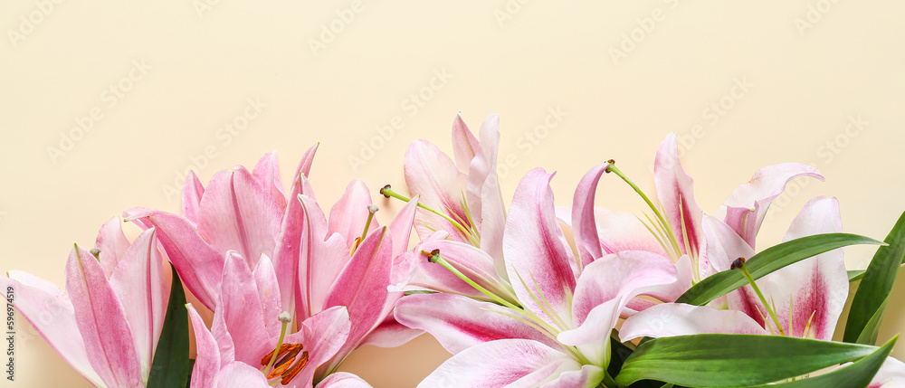 Beautiful lilies on beige background, top view