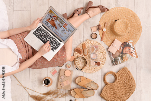Woman with laptop and acces...