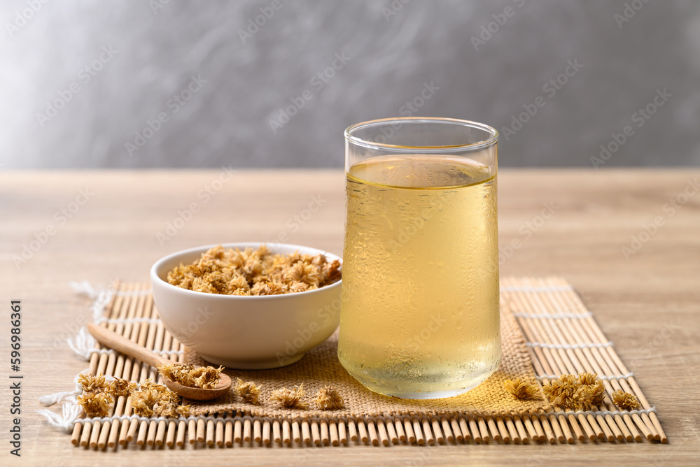 Chrysanthemum tea in glass and dry flowers, Healthy Herbal drink Chrysanthemum tea in glass and dry flowers, Healthy Herbal drink