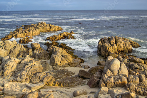 rocks at seashore late afternoon at Pebble Beach Carmel California
