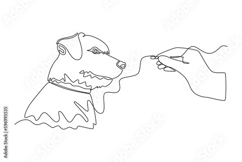 Continuous one line drawing dog get medicine. Urban pets concept. Single line draw design vector graphic illustration.