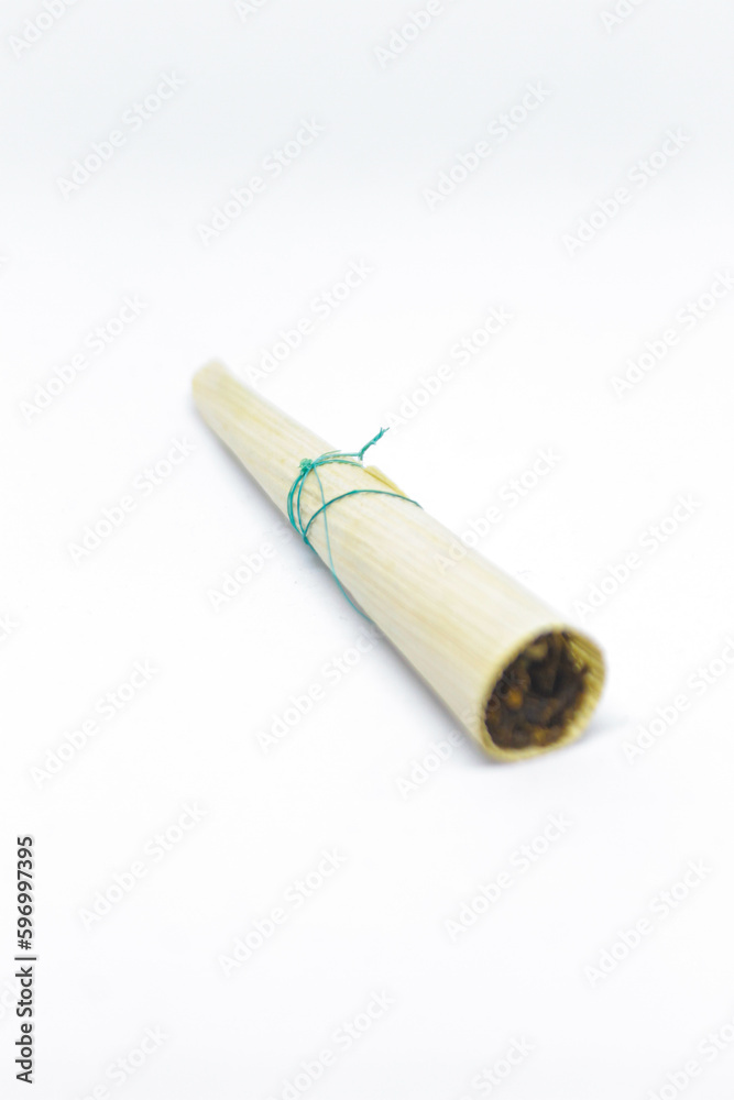 traditional 'klobot' cigarette isolate object on white background traditional 'klobot' cigarette isolate object on white background