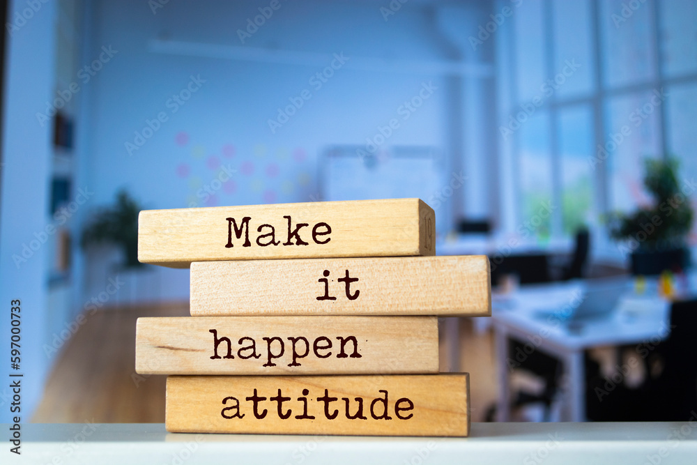 Wooden blocks with words 'Make it happen attitude'. Wooden blocks with words 'Make it happen attitude'.