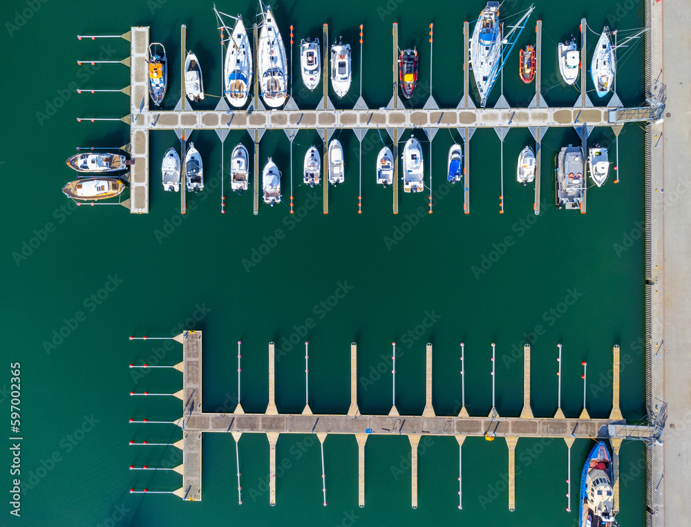 Aerial view landscape port marina Poland Gdynia. Boats, sailboats and yachts parked, seen from above.