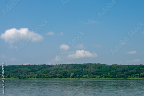 Oskol Ukraine. Big river Oskol in the east of Ukraine. Beautiful landscape of the river against the backdrop of the forest and blue sky.