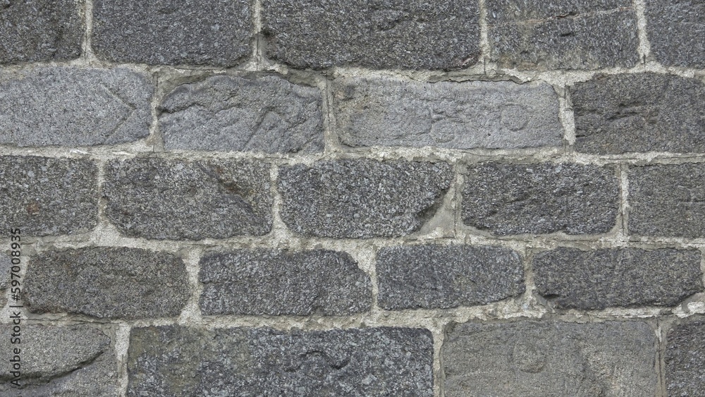 Detail of a stone wall with different size of rocks. Detail of a stone wall with different size of rocks.