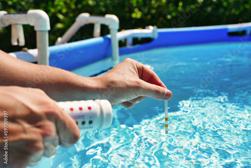 Swimming pool test water on ph and chemical balance.