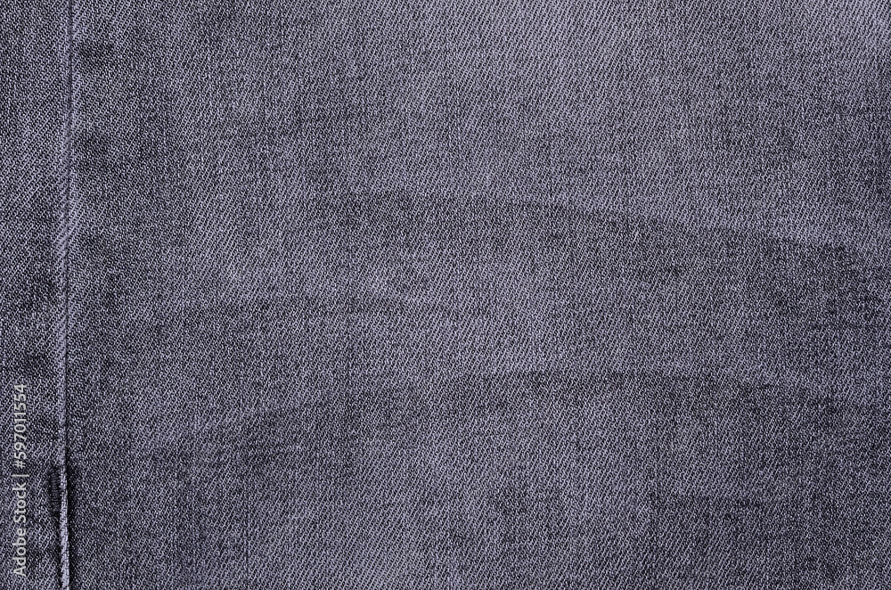 Gray denim background.
