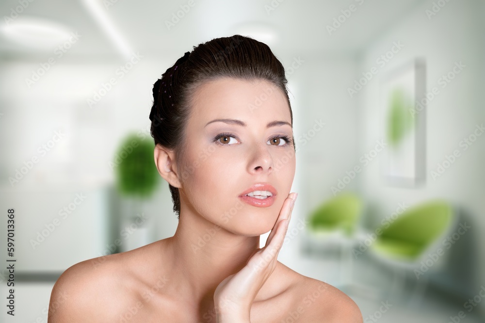Healthy skin concept, beauty young woman putting moisturizer on hand Healthy skin concept, beauty young woman putting moisturizer on hand