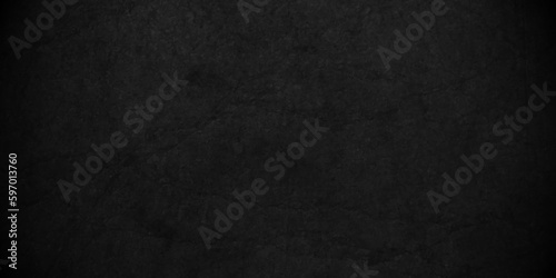 Dark black wall rough grainy grunge backdrop stone texture background. Natural Dark concrete grunge wall texture background, and backdrop natural pattern. Stone black texture background.