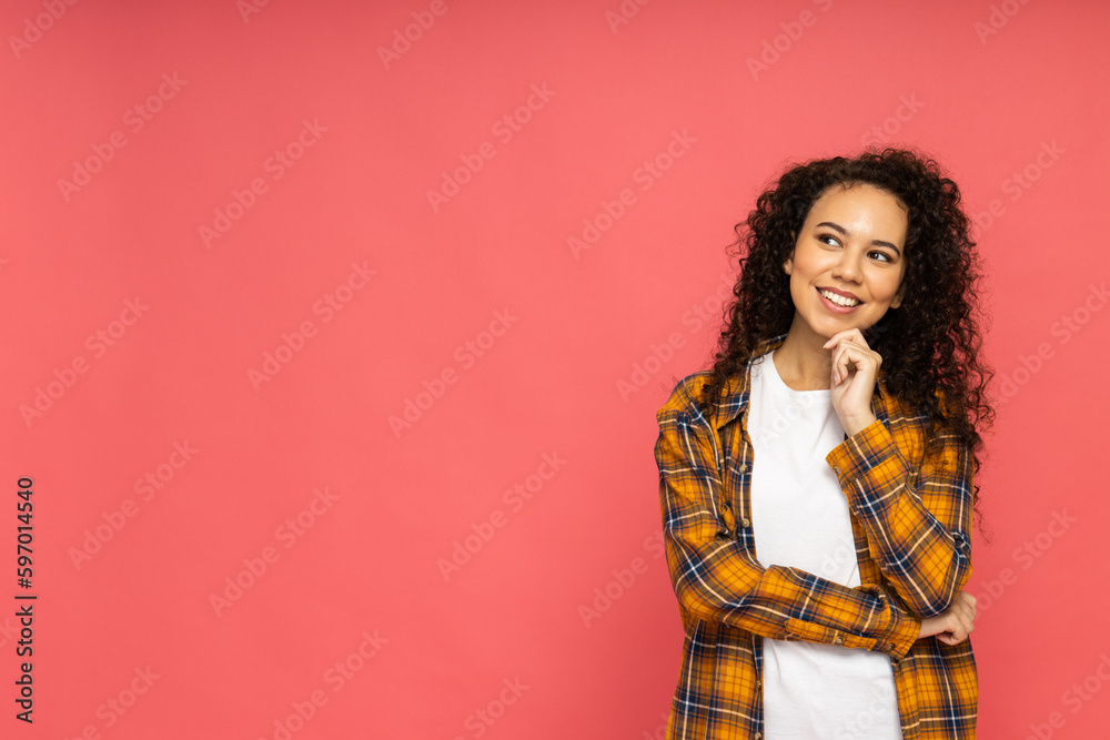Young woman in casual wearing on pink background Young woman in casual wearing on pink background