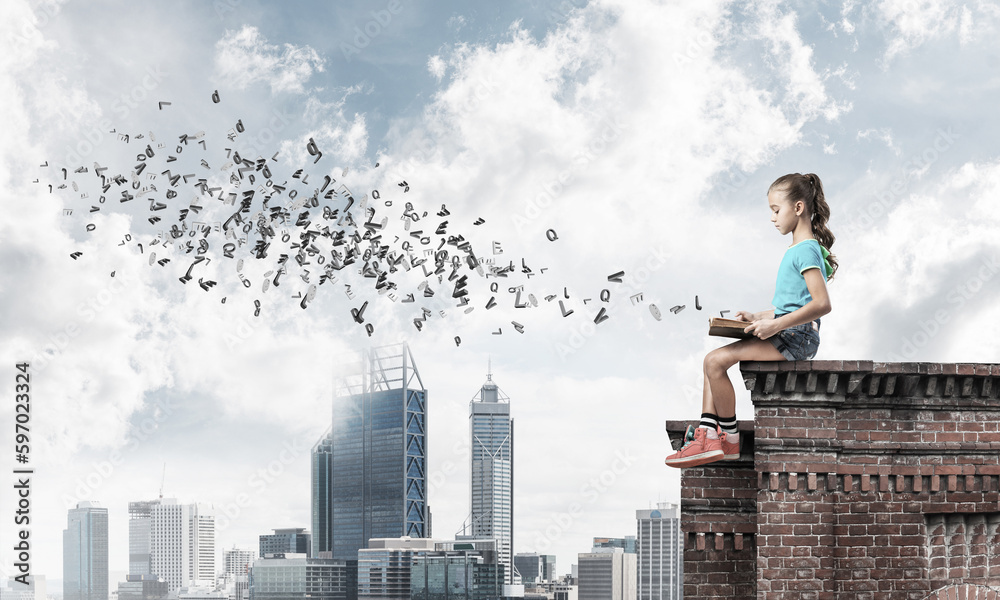 Concept of careless happy childhood with girl exploring this world