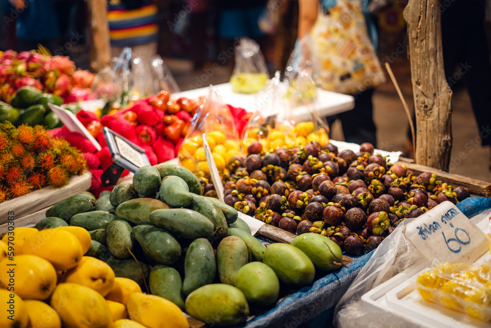 Tropical fruits in fruit market at night streetfood market
