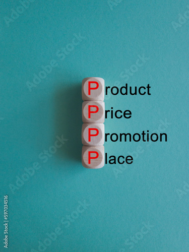 PPPP product price promotion place symbol. Concept words PPPP product price promotion place on wooden cubes on beautiful blue background. Business and PPPP product price promotion place concept. photo