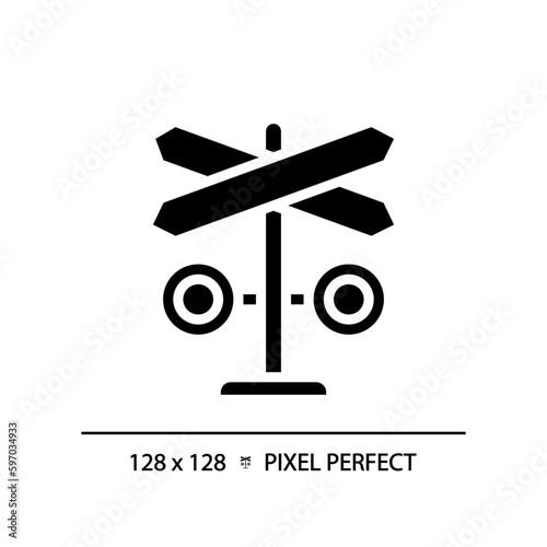 Level crossing pixel perfect black glyph icon. Rail safety. Warning device. Railway track. Railroad barrier. Silhouette symbol on white space. Solid pictogram. Vector isolated illustration