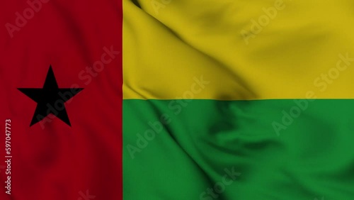 Guinea-Bissau flag waving in the wind. 4K video. photo
