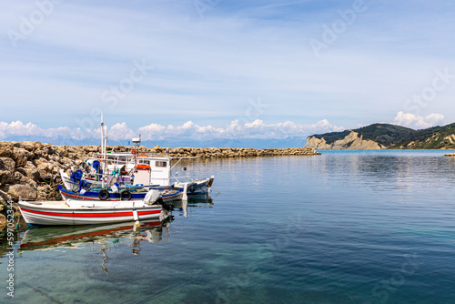 boats moored in the sea harbor of the Ionian Sea island of Corfu in Greece