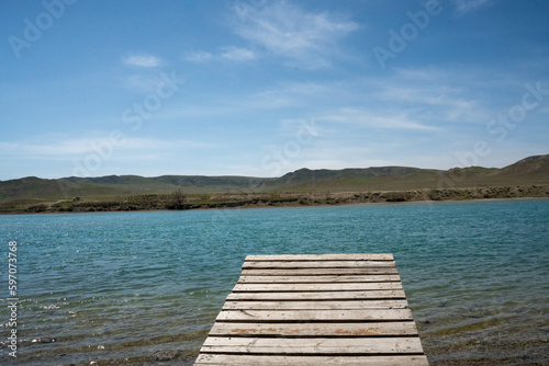 wooden pier on the lake, Ili River Kazakhstan, Central Asia