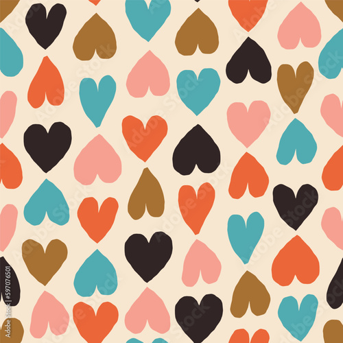 Seamless romantic pattern with coloured hearts. Seamless hearted texture. Valentine's Day background