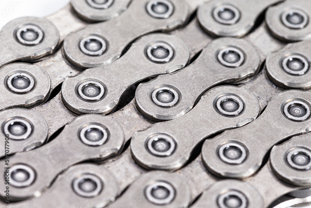 Extreme Closeup Background Texture of New Good Oiled Roller Bicycle Chain. Extreme Closeup Background Texture of New Good Oiled Roller Bicycle Chain.